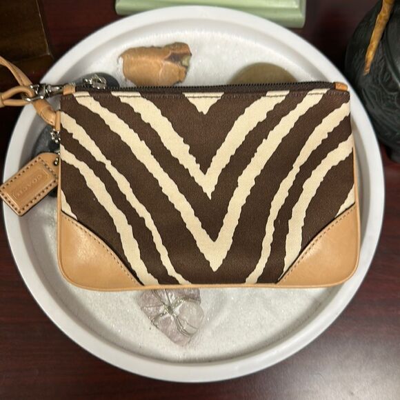 Coach Ivory Brown Animal Print Material Leather Silver Tone Hardware Wristlet - Picture 1 of 12